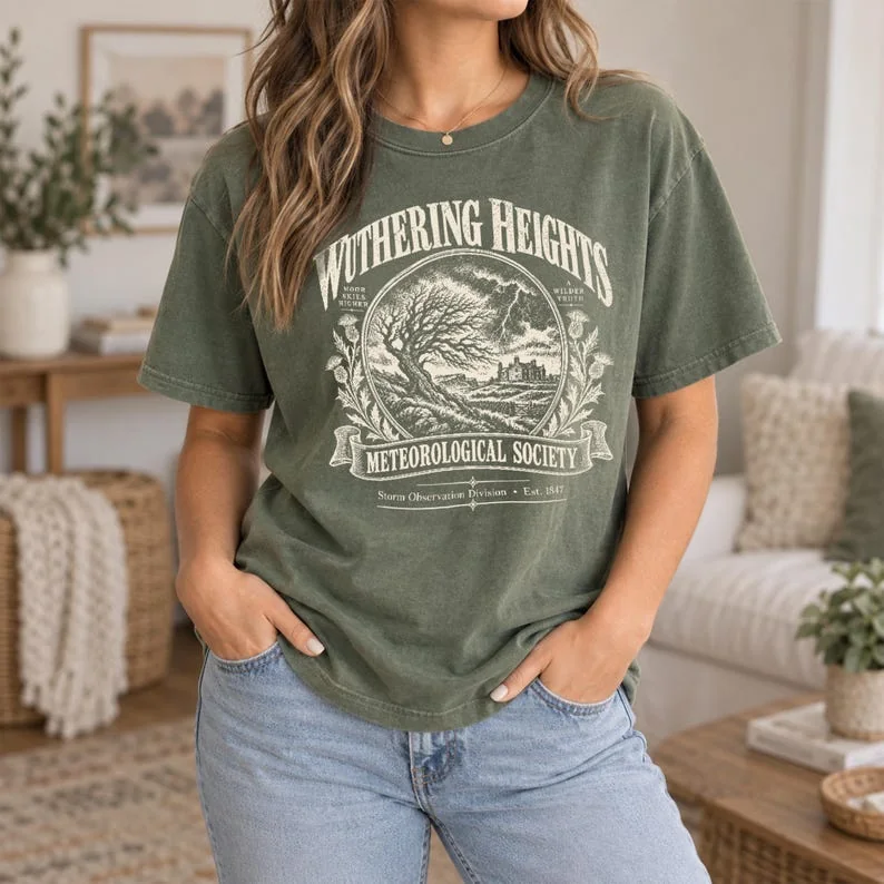 Moss green Comfort Colors Wuthering Heights shirt with cream Gothic moorland and storm society design.